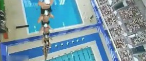 Japanese commercial featuring swimmers building a human tower pillar and belly flopping to the finish line
